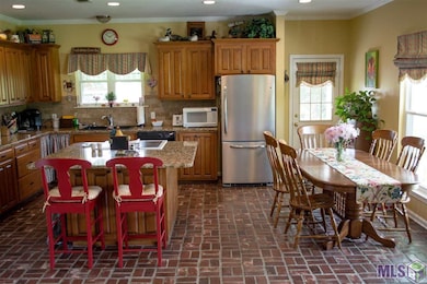 Nice open kitchen/dining with views of the lake.