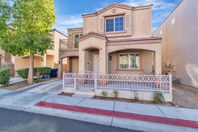 View of front facade with a porch, stucco siding,