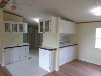 Open Kitchen With Lots Of Cabinets