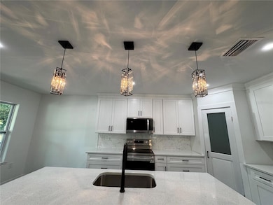 408 SE 1st St, Williston, FL 32696 - photo 7