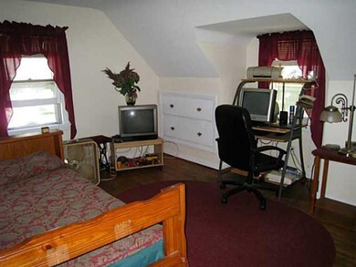 Bedroom. Upstairs 2nd bedroom just painted. Hardwo