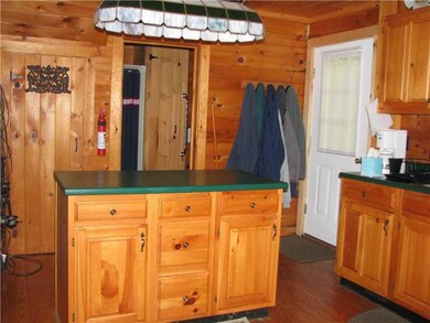 Kitchen. Island with cabinet space.