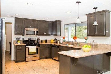 Gourmet kitchen with granite counter tops, stainle