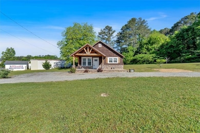 View of front of property with a front lawn