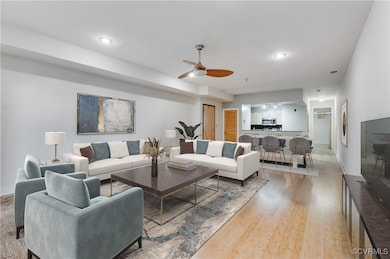 VIRTUALLY STAGED Living area featuring a ceiling f