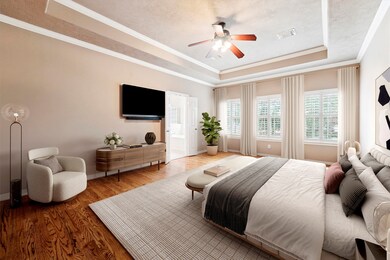  The second-level primary suite features an en-sui