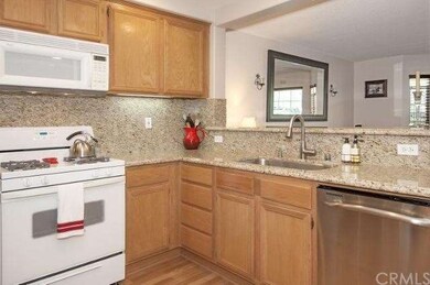 Kitchen opens toe family room with counter with ro