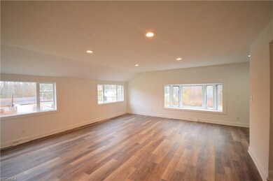 Spacious living room with plenty of natural light 