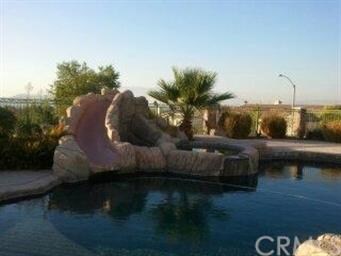 Built in Rock Pool with slide and jacquizzi with w