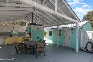 Summer kitchen and front of guest house
