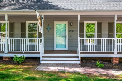 Entrance to property with covered porch