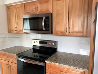 GLASS TOP STOVE AND BUILT-IN MICROWAVE. GREAT FOR THE COOK.