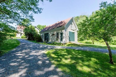Original carriage house holds boats,...