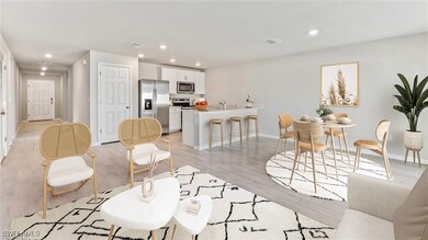 Living room featuring light wood-style flooring, r