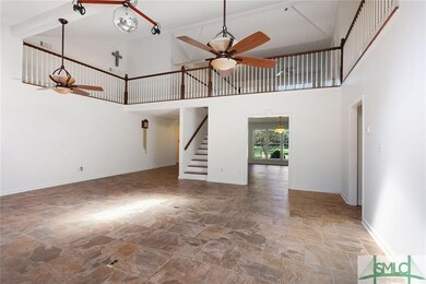 Office space upstairs, flanked by a bedroom with i
