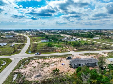 Street corner: Holly Dr (Road 4703) and King Place