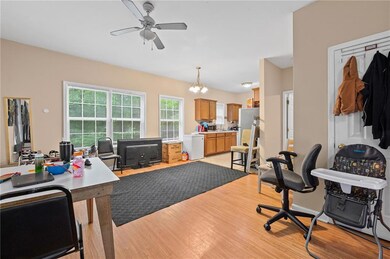 Office area featuring light wood-style floors, vis