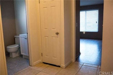 Oversized hallway between 3 bedrooms and full bath