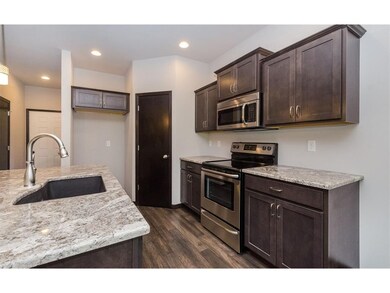Kitchen view w/Stainless Steel appliances