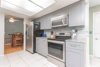 Kitchen with stainless steel appliances.