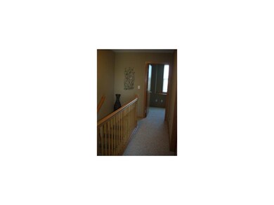 Other. View of upstairs hallway - beautiful woodwo