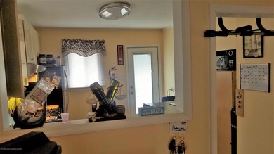 view to kitchen from LR