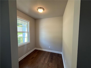 Flex space perfect for an office or workout room!