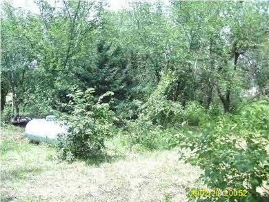 WOODED LOT TO THE NORTH