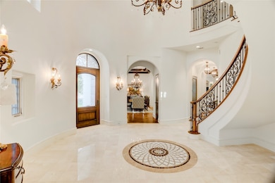 Groin vaulted hallway leading from entry rotunda t