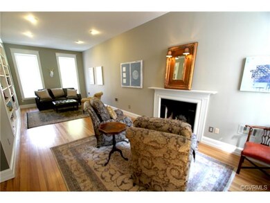 Another view of the Living Room with fireplace and