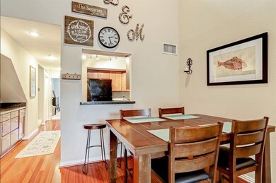Kitchen overlooking family and breakfast room