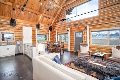 Soaring ceilings, contemporary lighting and views!