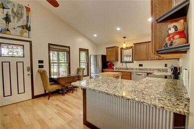 Gleaming Maple floors and granite counter tops.