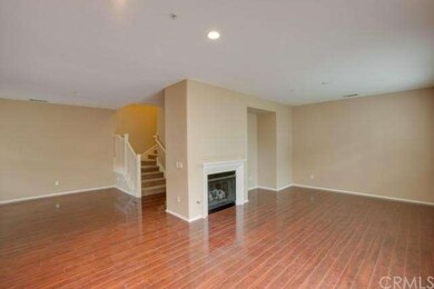 Large great room with newly installed laminate flo