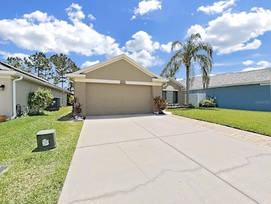 Driveway and garage door view.