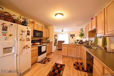 Spacious Kitchen with wood flooring