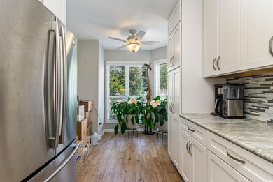 Kitchen featuring stainless steel refrigerator, li