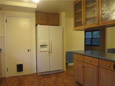 Kitchen. Cooks have the side-by-side fridge and ki