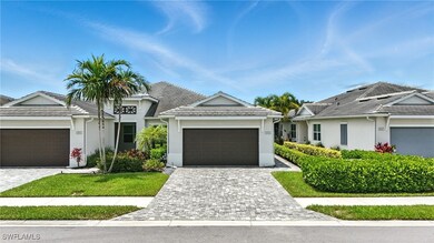 Single story home featuring stucco siding, an atta