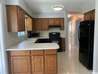 The breakfast bar has extra storage beneath the co