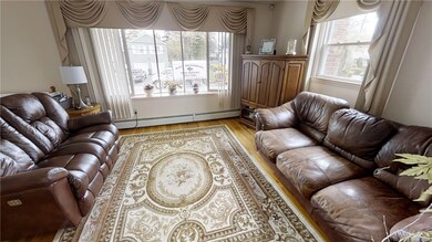 Beautiful hardwood floors and pretty bay window