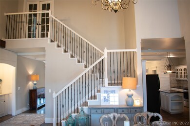 Beautiful french doors at top of stairway landing