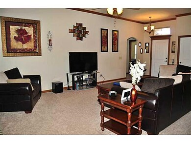 Living Room. Features include 10 ft ceilings,  ups