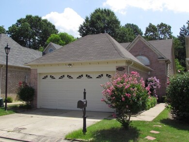 Beautiful brick exterior on zero lot, backs up to 