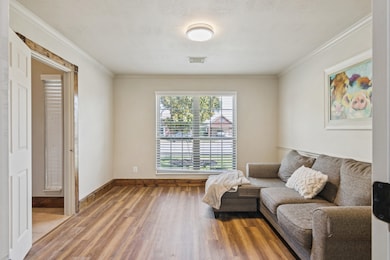 Study with beautiful floors. This room could also