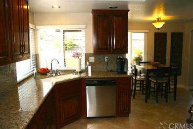 Kitchen with Custom Cabinets, Granite & Stainless 