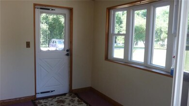 Sunroom front door with bow window