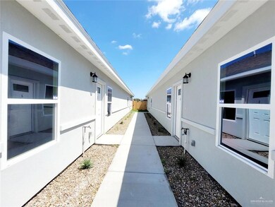 View of side of property featuring stucco siding