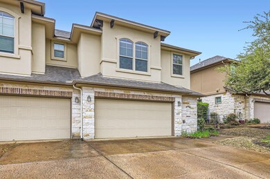View of front facade with an attached garage, sto
