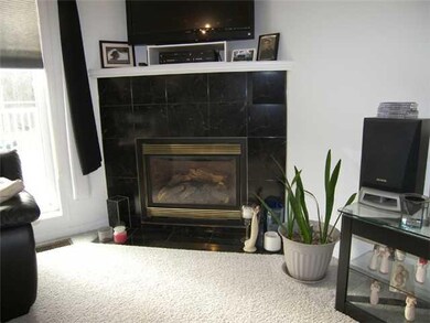 Great Room Black marble accents an awesome gas fir